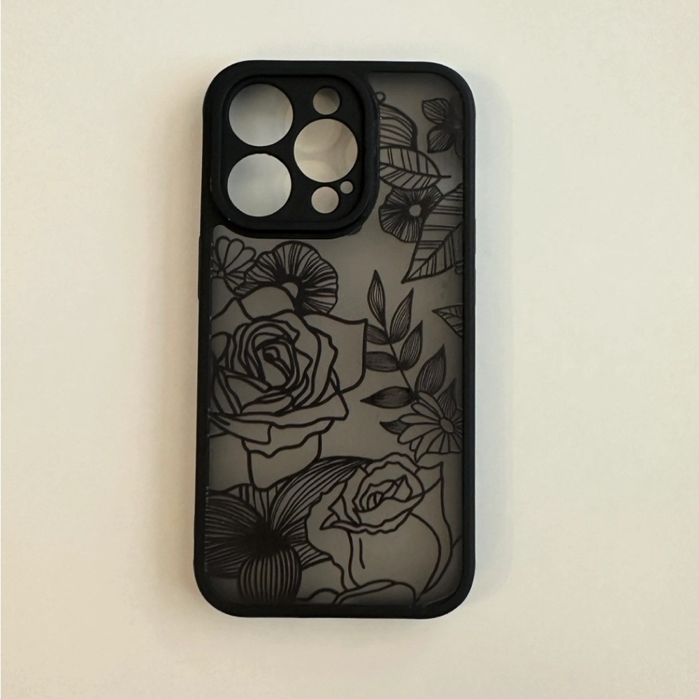 Black iPhone 14 Pro case with flowers
